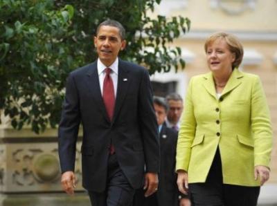 La canciller alemana recibe a Obama junto a un campo de concentración nazi