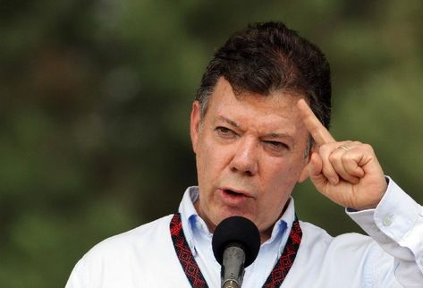 Santos suspende diálogo con las Farc y ofrece 273 mil dólares para capturar autores del coche-bomba